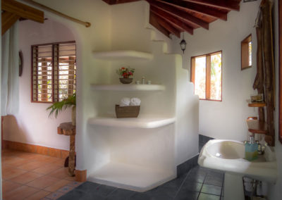 Honeymoon Suite bathroom with local design and rainforest views in Matapalo Osa Peninsula Costa Rica