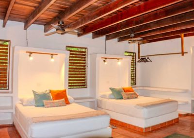 Olas 1 ground-level suite at Casa Olas in Matapalo with two queen beds and large private patio at Encanta La Vida beachfront lodge