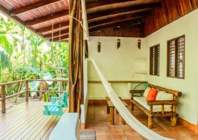 Luna Love Shack exterior with deck and hammock in the rainforest of Matapalo Osa Peninsula Costa Rica