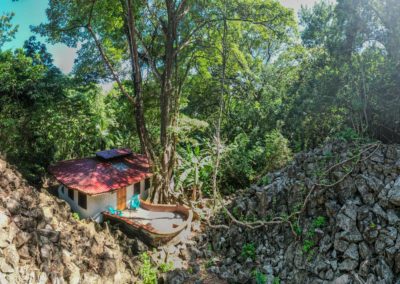 Aerial view of Luna Love Shack bungalow surrounded by rainforest in Matapalo Osa Peninsula Costa Rica