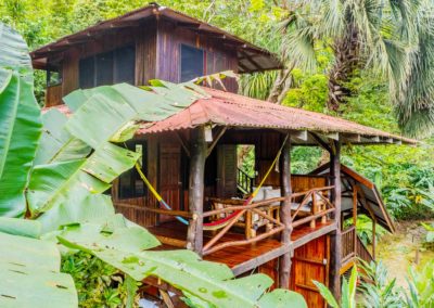 Treehouse Costa Rica surrounded by tropical gardens at Encanta La Vida