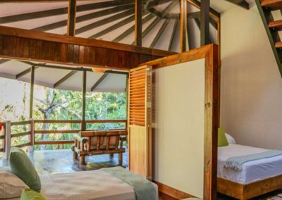 Treehouse Suite Matapalo -Stargazer second‑story suite at Casa Sueños beachfront lodge in Matapalo with king and queen beds on private covered deck